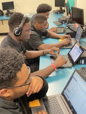 Digital C boys working on computers